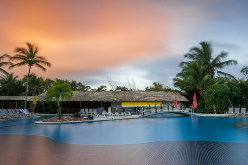 deville piscina swimingpool hotel sunset puesta sol larga exposición palmera salvador bahia brasil