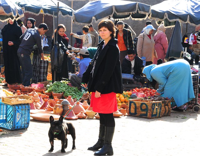 Lady with her pet in the souk (market), Marrakech, Morocco
