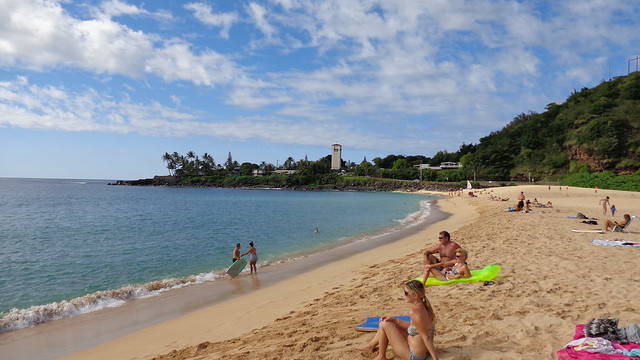 A day at the beach. Waimea Bay, north shore Oahu Hawaii.