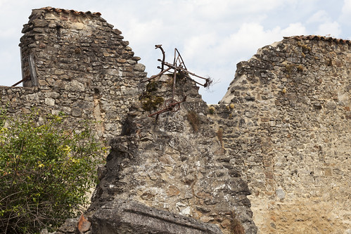 Raised bike remains | Recette Buraliste | P Vilatte | Oradour-sur-Glane | Martyr Village - 54 by Paul Dykes, "The original village [of Oradour] was destroyed on 10 June 1944, when 642 of its inhabitants, 