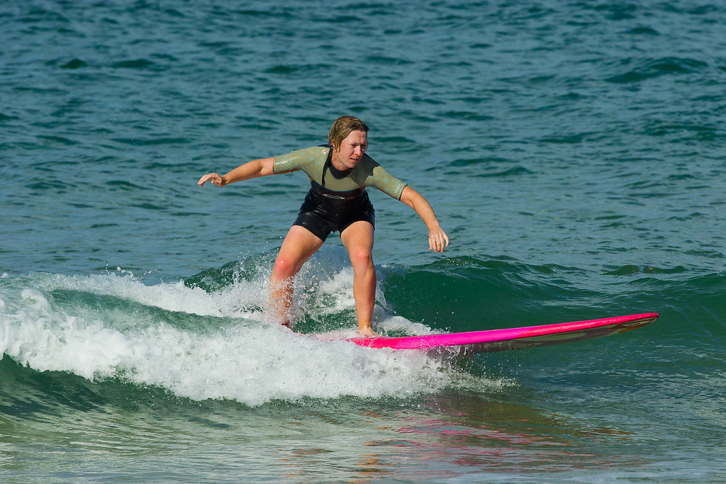 Sophie Walker of England rides a wave during a surfing les… | Flickr
