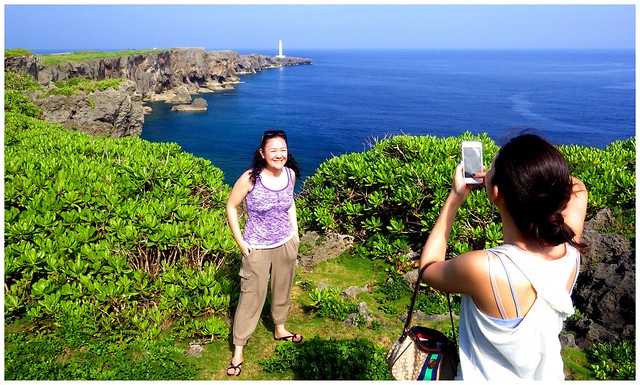 OKINAWA FAMILY ALBUM - Younger Sister Shoots Her Older Sister Near the Cliff-Side Edge of CAPE ZAMPA