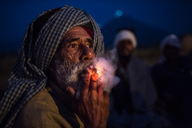 Marwari Camel Trader smoking a cigarette in the Pushkar Camel Fair