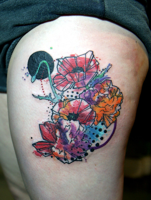 graphic watercolor flower tattoo