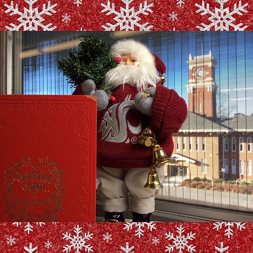 Santa reading A Christmas Carol by Charles Dickens @wsulibrariespullman #WSU #GoCougs