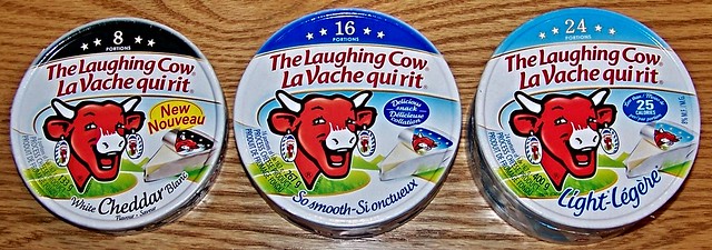 Three kinds of Laughing Cow cheese; three different sizes