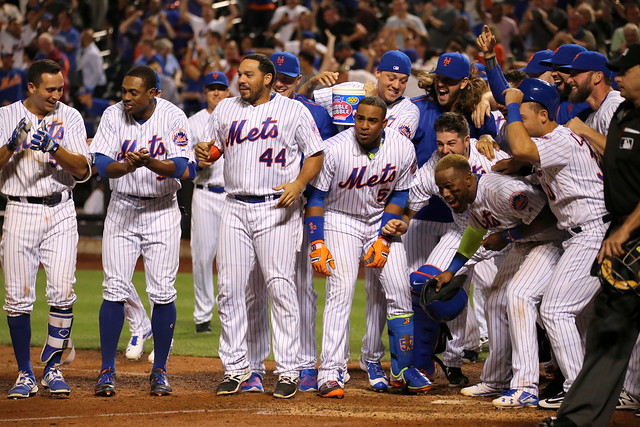 The Mets await Asdrubal Cabrera at the plate after his walk-off homer in the 11th inning.