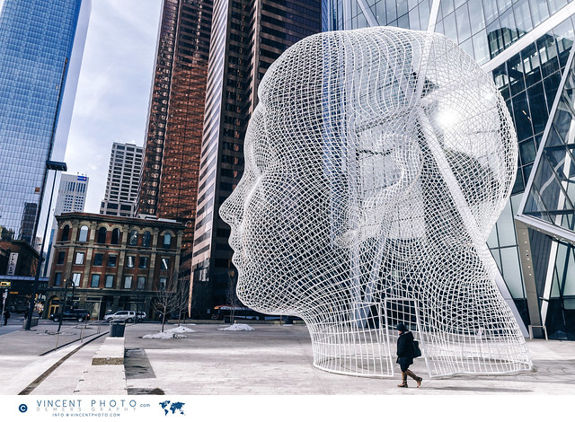 Wonderland is a sculpture by Spanish artist Jaume Plensa. The  public art installation is located at the foot of the Bow, the tallest office tower in Calgary, Alberta, Canada. The head scultpture was unveiled on January 25, 2013.