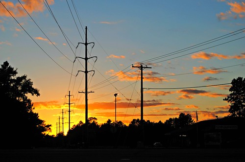 wires poles orange sky clouds trees wisconsin wi midwest northernwisconsin unitedstates usa unitedstatesofamerica spooner spoonerwi spoonerwisconsin sunset