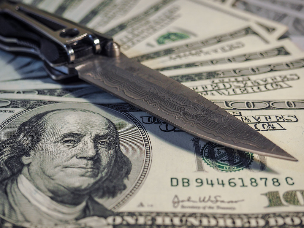 Knife and dollars