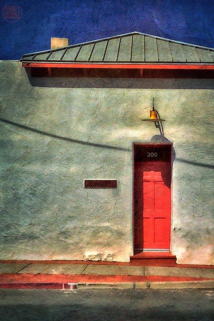 Red door, yellow lamp, blue sky...adobe streetscape, primary colors, Tucson