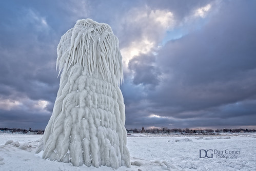 Ice Warrior II by Dan Gomer, South Haven Lighthouse captured after sunrise.winter lighthouse snow ice landscape nikon michigan la