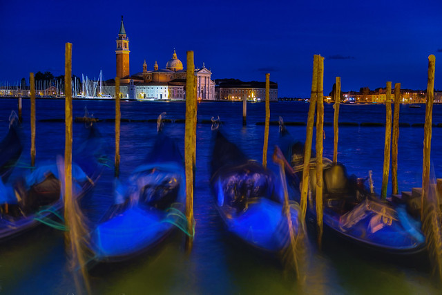 View of gondolas and the Church of San Giorgio Maggiore across the Venice lagoon