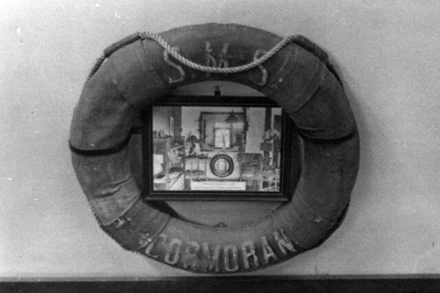 A photo of a life preserver and photo of the SMS Cormoran in the USN Memorial Museum, Washington, D.C. Photo from the Herbert T. Ward Collection Courtesy of the Micronesian Area Research Center (MARC).