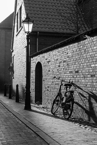 street shadow bw sun bicycle wall 35mm nikon d90