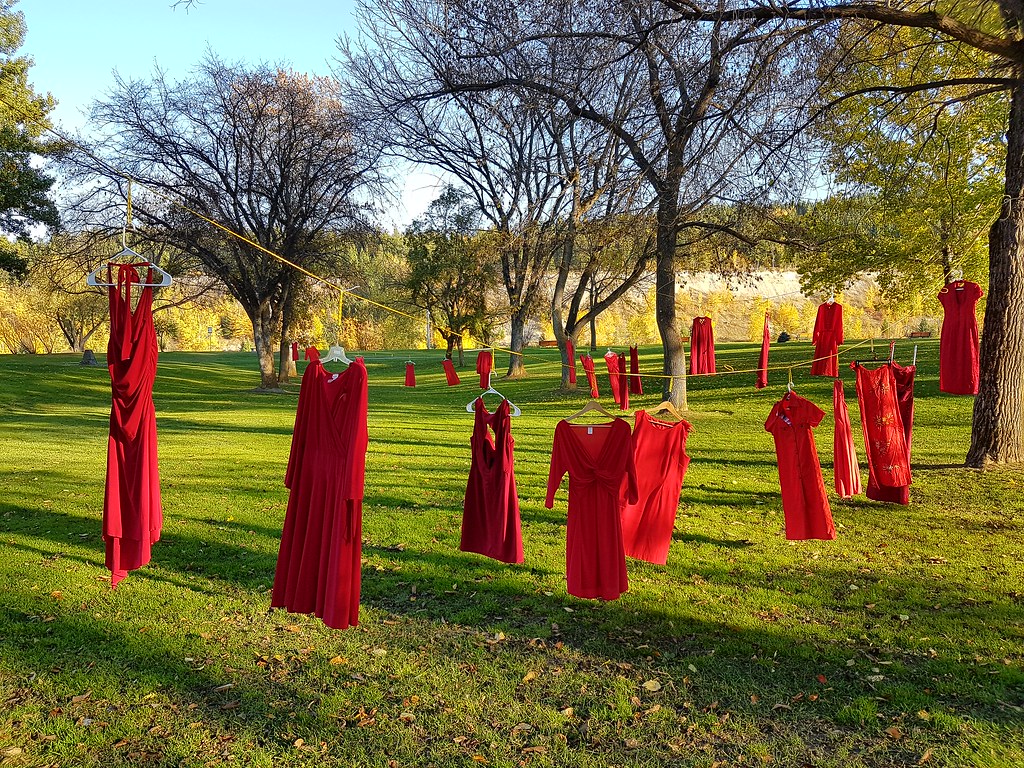 red dresses hung in trees Red Dresses Raise Awareness of Violence Against Indigenous Women