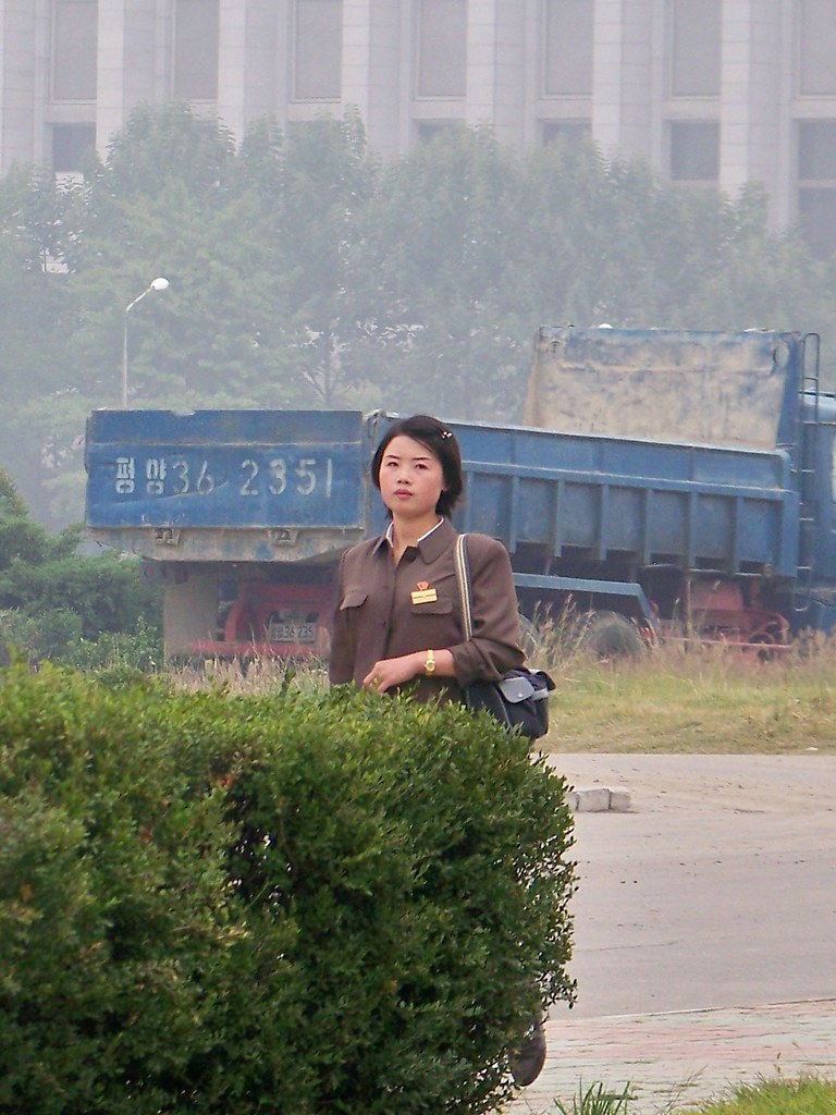 Woman commuting in Pyongyang North Korea