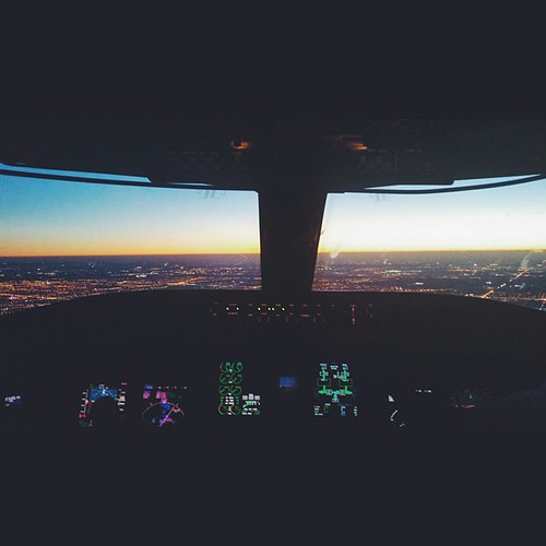 The most beautiful view of a Chicago sunset from the cockpit of a CRJ-900. #crj #delta #pilotlife #jumpseat by ScroogePhotography, square squareformat iphoneography instagramapp uploaded:by=instagram