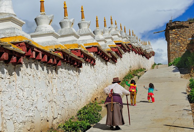 Childs play on the outer kora of Litang Monastery, Tibet 2014
