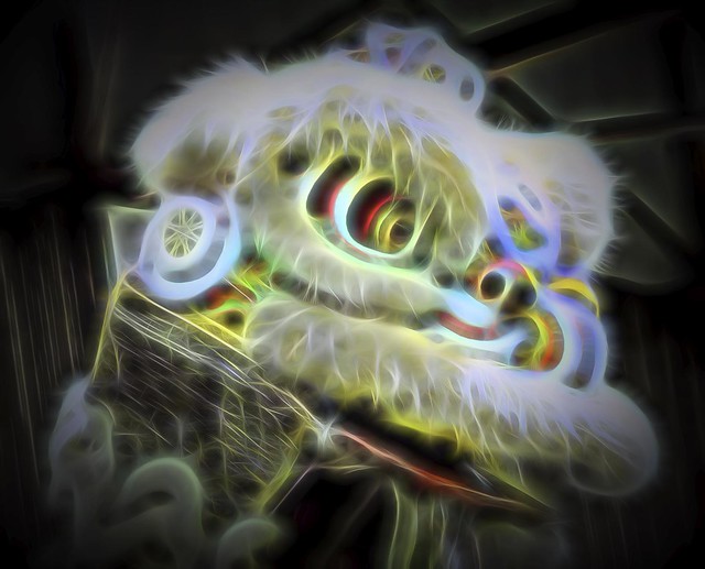 Chinese Lion costume enhanced with Topaz Glow Brilliant Fibers 3 preset with increased electricity setting and reduced glow saturation