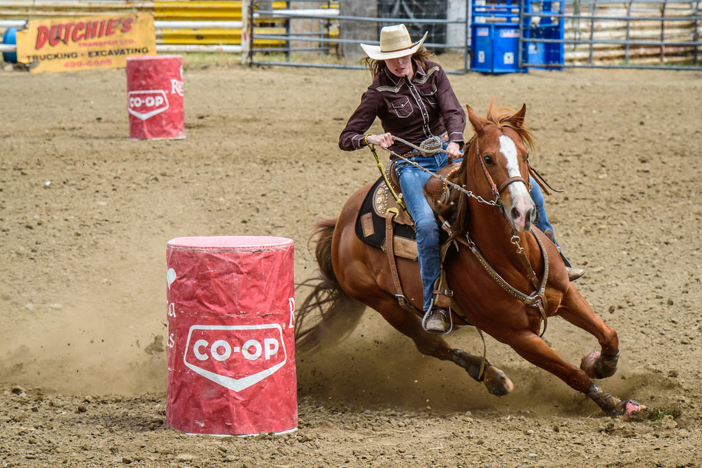 Riders compete in the women's barrel racing at the 78th annual Keremeo...