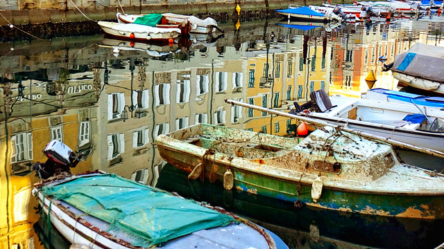 Boats in la Piazza del Ponte Rosso, Trieste, Italy