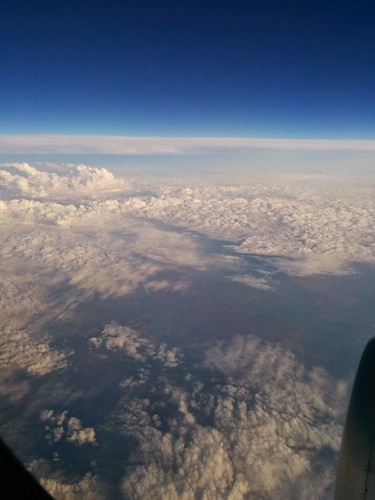 blue sky white window weather airplane flying earth united wing couds