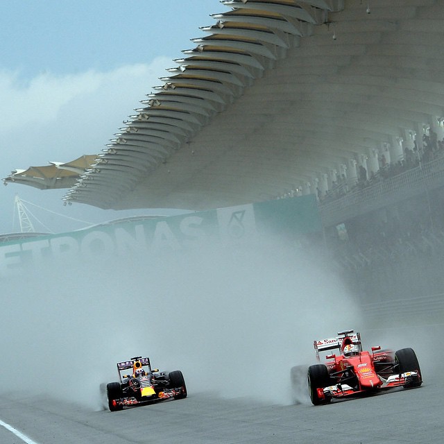 Sebastian Vettel and Daniel Ricciardo during the rain inte… | Flickr