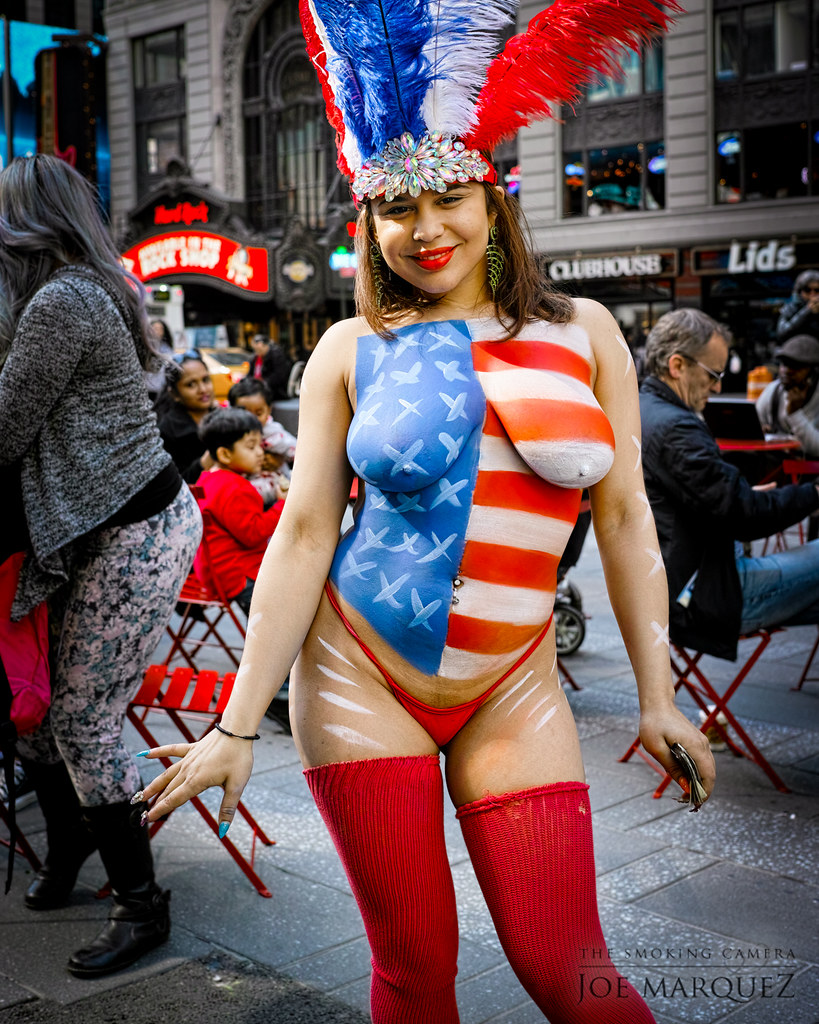 USA flag body painted girl at Times Square. 