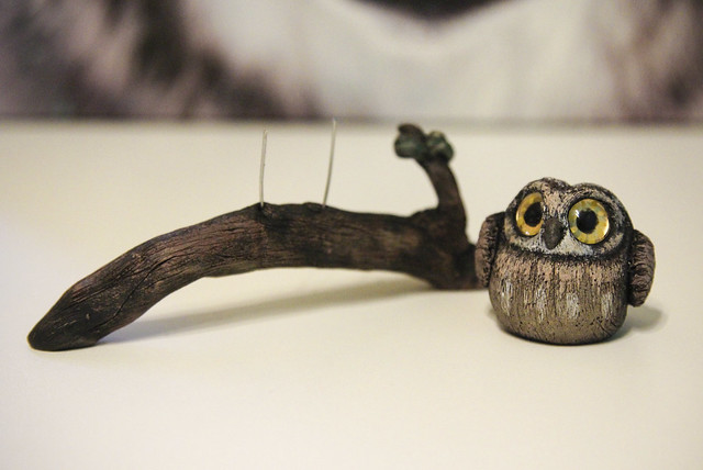 Owl with modeling clay