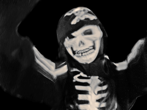 The child experiments with being a pirate skeleton by Juli Kearns (Idyllopus)