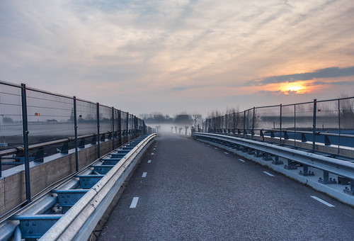road bridge mist fog clouds sunrise fence highway viaduct railing a4 vlaardingen schiedam hff sundawn middendelfland highwayconstruction otherkeywords woudweg nederlandvandaag