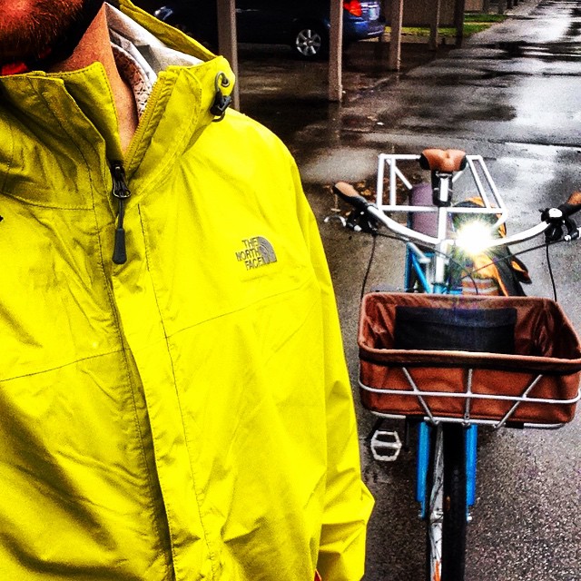 Perfect day to test out my new bright yellow rain jacket. #commuterspecial #commutingadventures #alternativetransport #activelife #bike #bikelife #yuba #mundo #cargobike #bicycle #spring #northface #nobadweatherjustbadgear