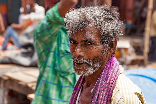 Portrait of a man at Mechua market in Kolkata, India.
