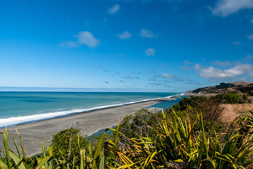 sea newzealand tree beach water clouds hills southisland inlet flax southpacificocean hapua northcanterbury hurunuirivermouth
