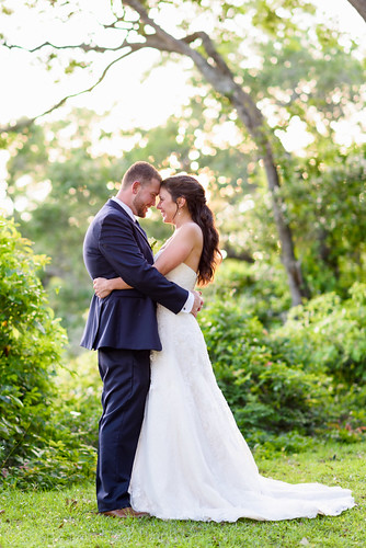 Happy couple backlit by the sunset through the trees - Little River by Ryan Smith Photography, If you share this image please check the creative commons license.wedding