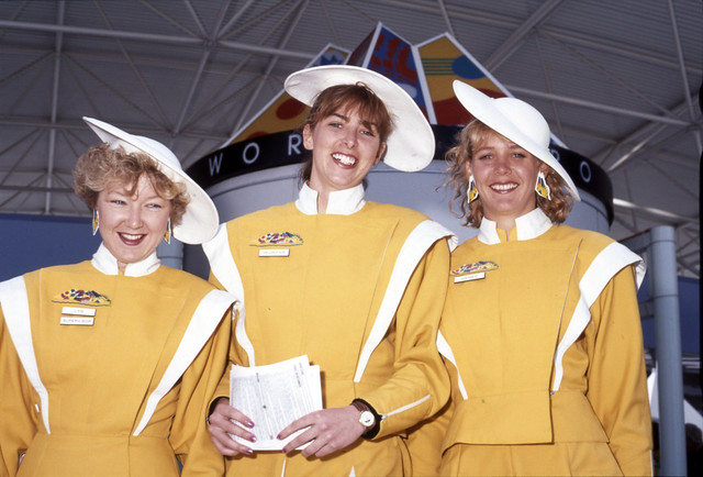 Hostesses working at Expo 88, wearing the bright yellow uniforms, South Brisbane, 1988