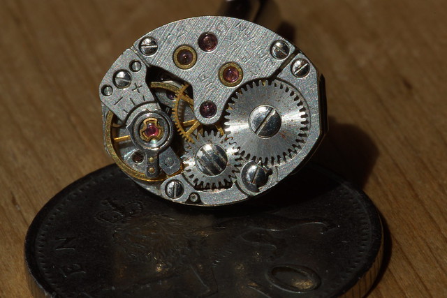 Cufflink and Coin