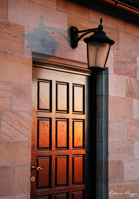 Door. Lamp. Light from the setting sun
