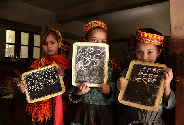 Kalah girls proudly display their blackboards, Pakistan
