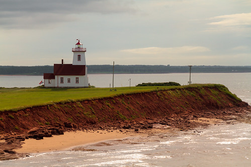 ocean light red lighthouse house canada beach water island sand prince atlantic edward shore maritime pei