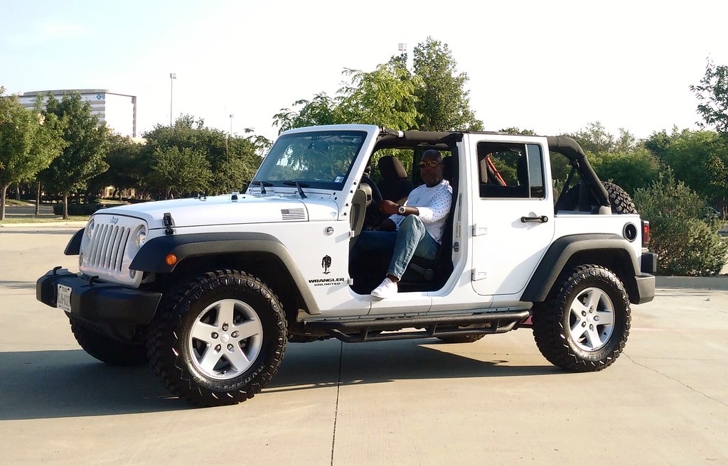 White Jeep Wrangler Unlimited With Top and Front Doors Off… | Flickr