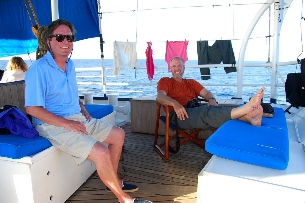 Mark & Fred enjoying some relax time on our schooner in the Galapagos Islands