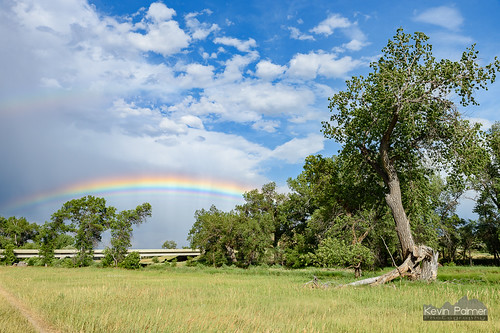 sheridan wyoming july summer afternoon tamron2470mmf28 nikond750 color colorful rainbow sky storm stormy weather clouds circularpolarizer green trees grass blue welchranchrecreationarea bridge