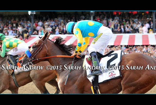 American Pharoah and Victor Espinoza at the wire, finishing second in the Travers