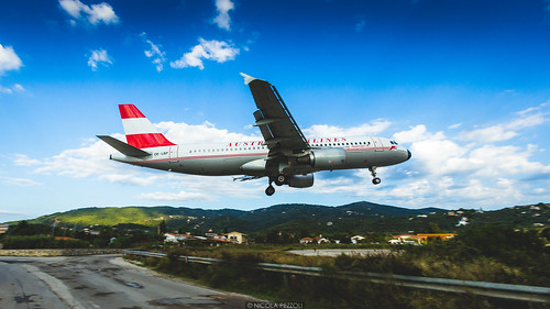 travel summer sunrise airplane landscape island airport landing greece airbus airlines skiathos austrian