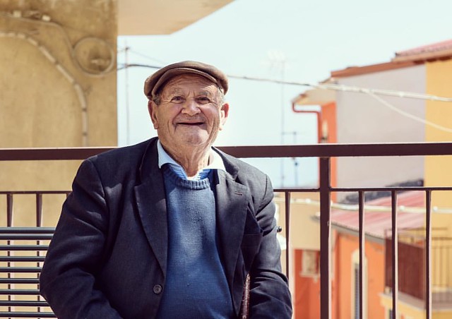 The bright side of life. Street portrait - Sicily, Italy