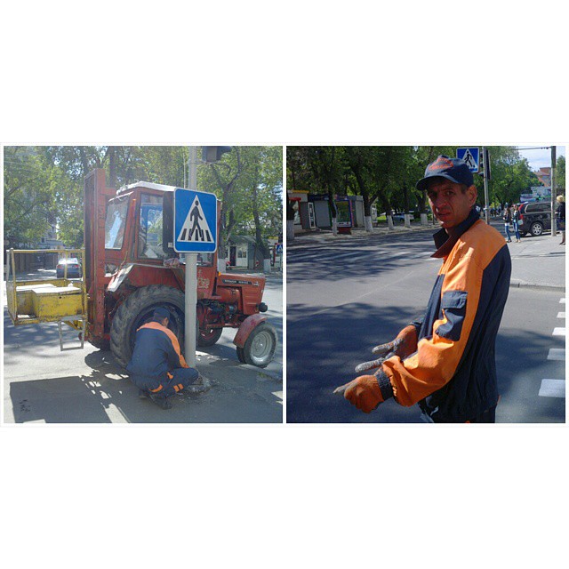 A pole painter #chisinau #chisinaustreet #everydaymoldova #everydayeasterneurope #worker #tractor #moldova