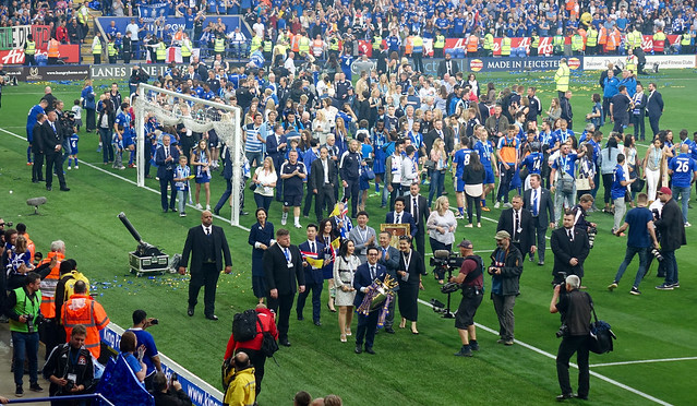 Leicester City Vice Chairman Aiyawatt Srivaddhanaprabha parades the Premier League trophy with his father and Chairman Vichai, after Leicester City's amazing season, 7 May 2016