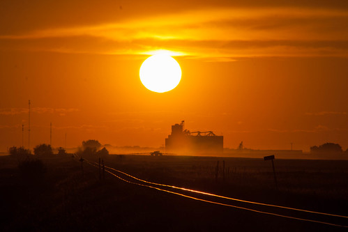 sunset tractor canada train farming elevator tracks saskatchewan weyburn